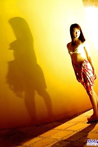 Asian Dick Tease Enjoys Running Nude On The Beach And Having Fun In The Water