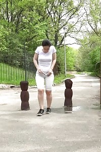 Black Haired European Looks Relieves After Pissing
