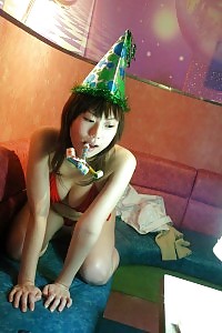 Thrilling Asian Co-ed Is In Her Red Bikini Exhibit Off Her Amazing Body