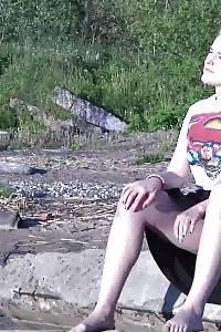 Stunning Blonde Squatting To Piss In The Countryside