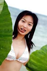 Asian Cocotte Is Naked And Exhibit Off Her Big Tits And Firm Ass While Playing